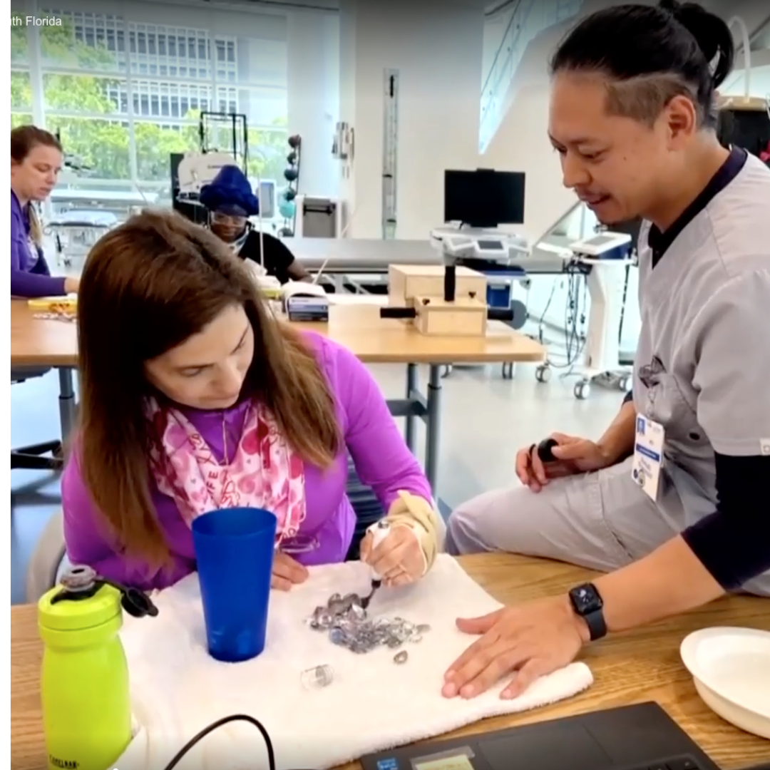 stroke survivor during occupational therapy with her therapist